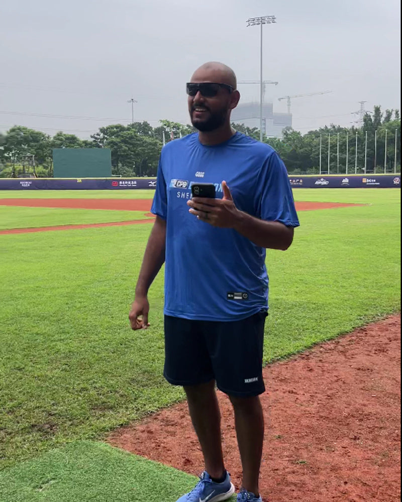 Dante Leach wearing BIVDIKO sports glasses during baseball training